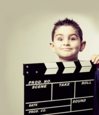 child and clapper board